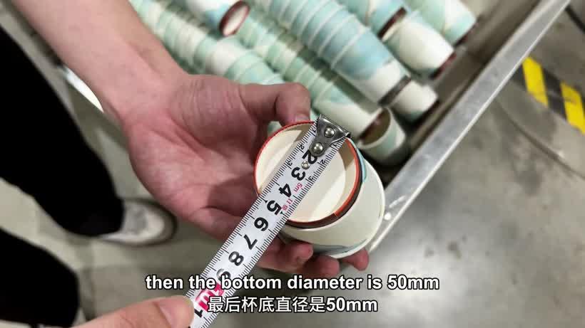 Measuring the 50 mm bottom diameter of the finished 6 oz double wall paper cup
